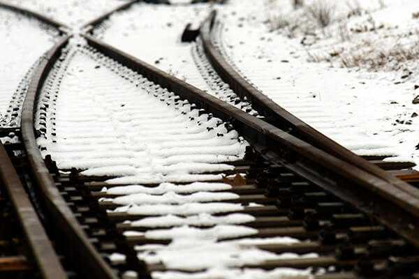 A train track covered in snow.